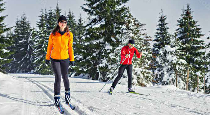 Man and woman doing cross-country skiing in Bragg Creek